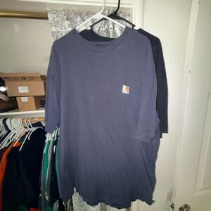 (2) Carhartt Men’s Short-Sleeve Pocket T-Shirt in Dark Navy and black.